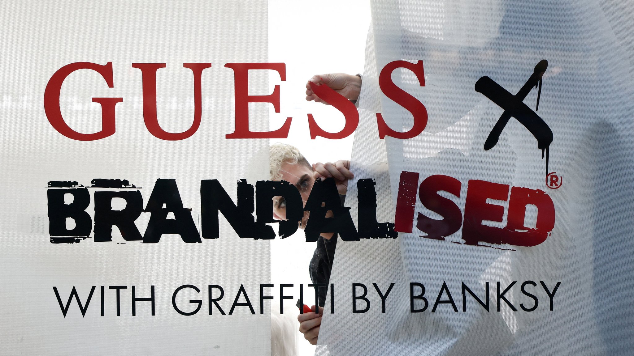 Concessie begin dutje Banksy accuses clothing brand Guess of 'helping themselves' to his artworks  - BBC News