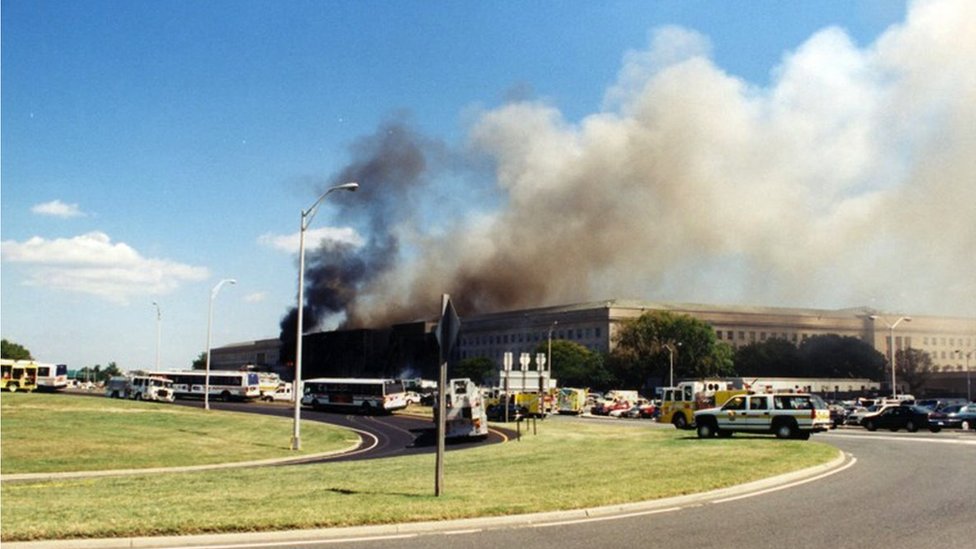 Smoke billows after the hijacked American Airlines Flight 77 crashed into the Pentagon in Arlington County, Virginia, US
