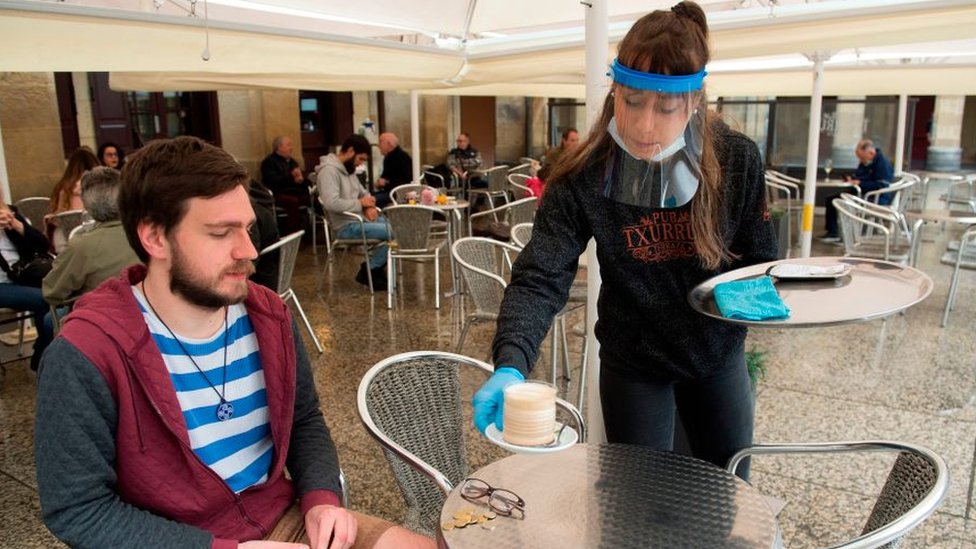 Waitress with face shield
