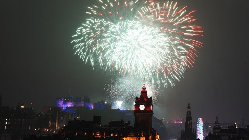 Fireworks explode over Edinburgh Castle during the street party for Hogmanay New Year celebrations in Edinburgh