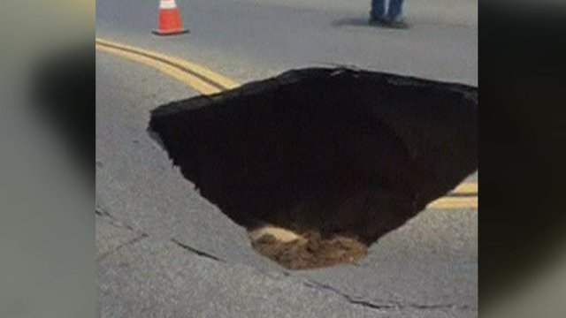 Sinkhole opened up on a street in Madera, California in America.