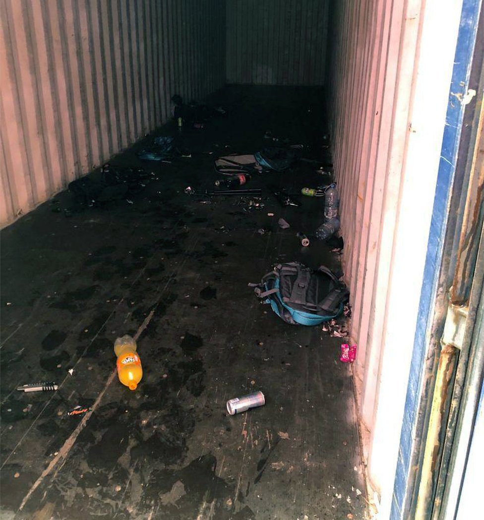 Rubbish left behind in a "hotel" container, after collectors have departed