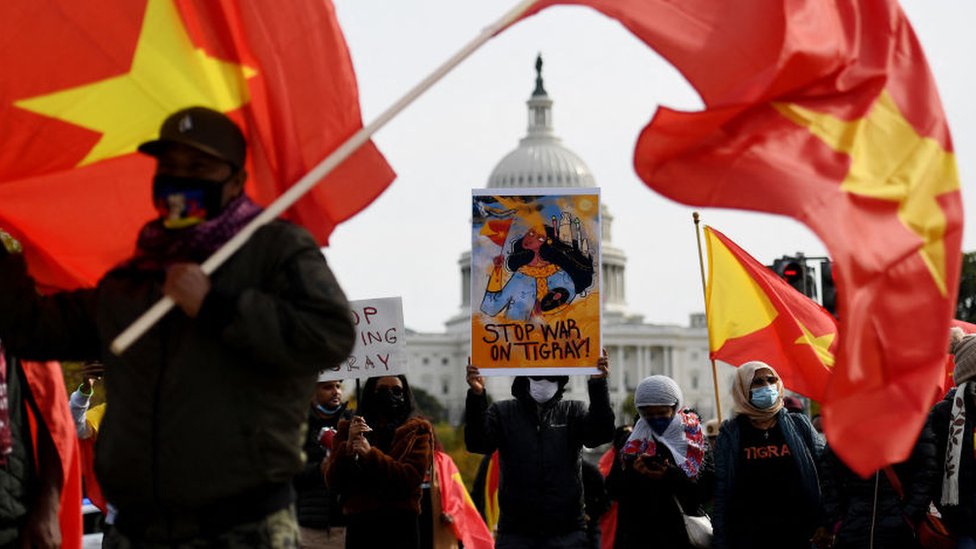 Demonstrators with Tigray flags and posters march on the National Mall in Washington, DC on November 4, 2021