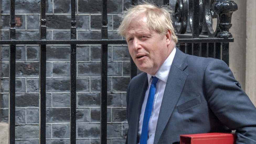 Boris Johnson vows to fight on despite resignations and calls to go