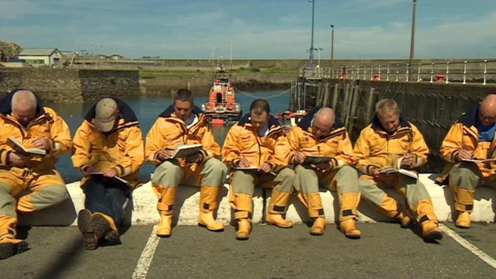 Fishguard lifeboat crew sketching