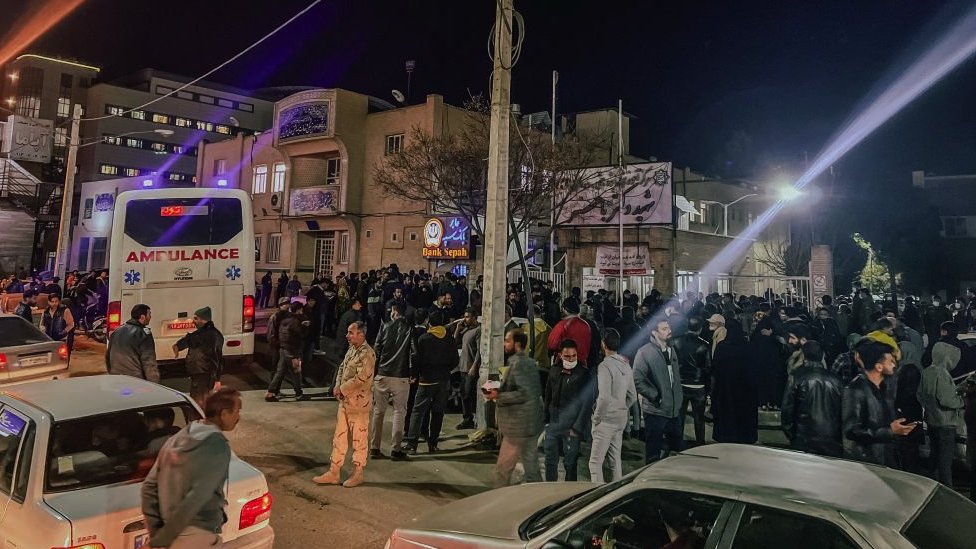 Crowds gather in Kerman following explosions