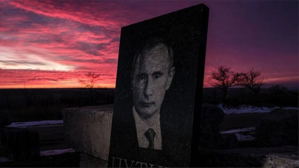 A billboard image of Vladimir Putin