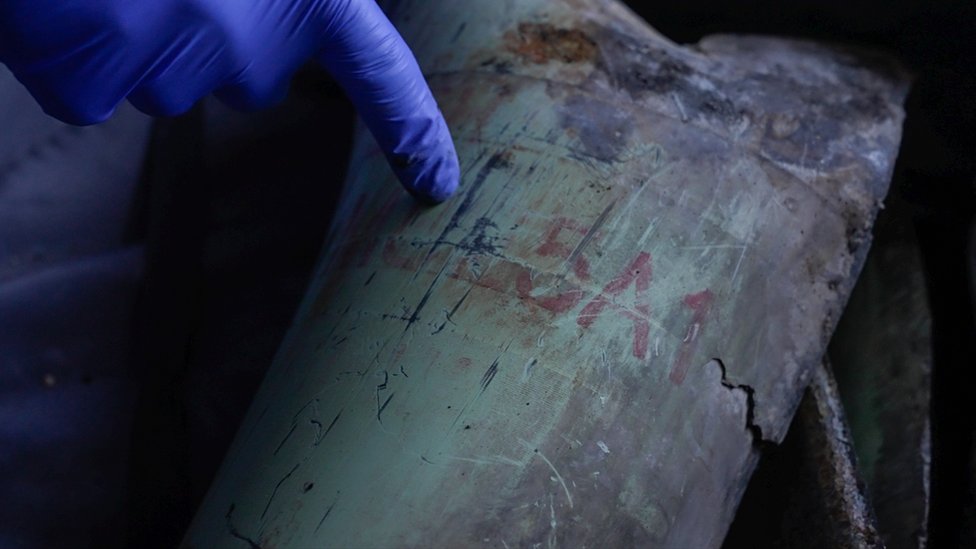 The professor points to the markings indicating the shell was US made. Earlier this year the US state department said it would investigate the improper use of American-made white phosphorus munitions in Lebanon