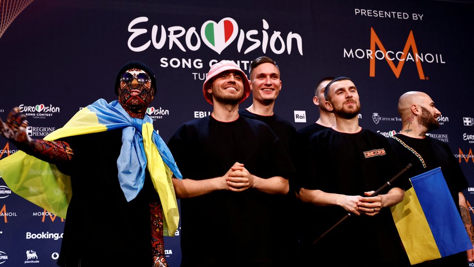 Kalush Orchestra from Ukraine pose for photographers after winning the 2022 Eurovision Song Contest, in Turin