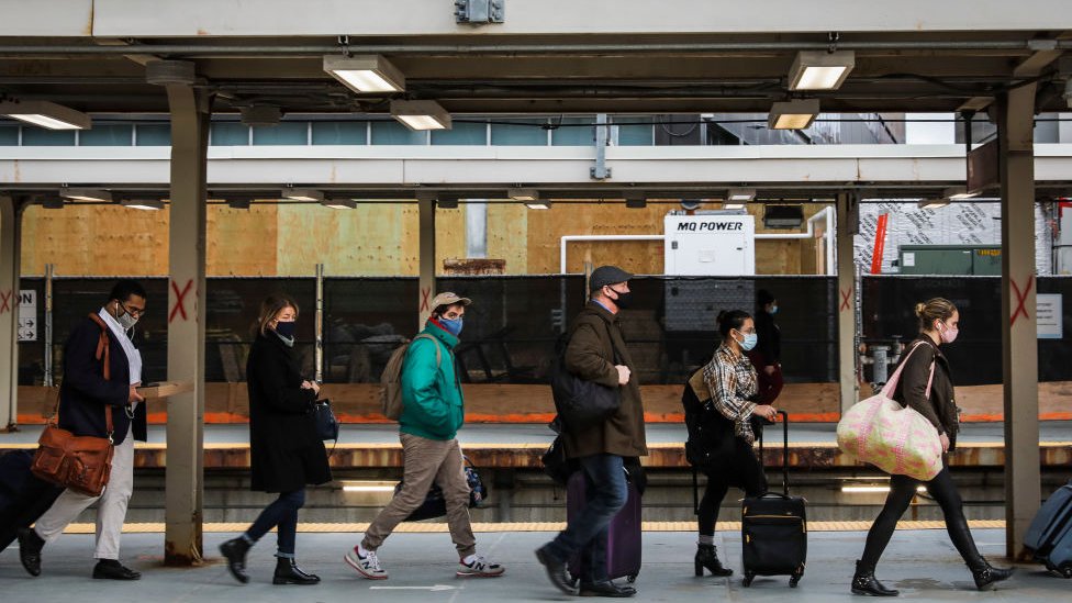 People travelling through Boston, Massachusetts the day before Thanksgiving