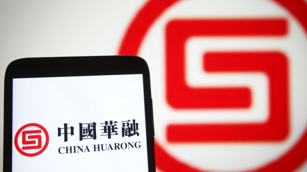 China investment firm's shares slump after $6.6bn bailout