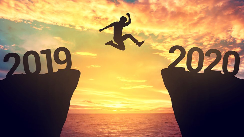 Person jumping between 2019 and 2020 years