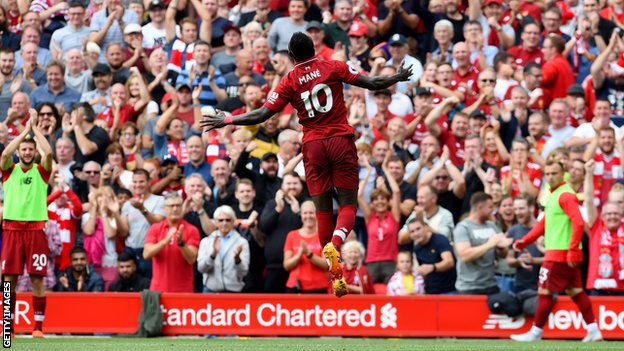 Sadio Mane celebrates scoring for Liverpool