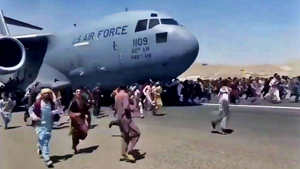 Hundreds of Afghans rushed desperately to the runway.