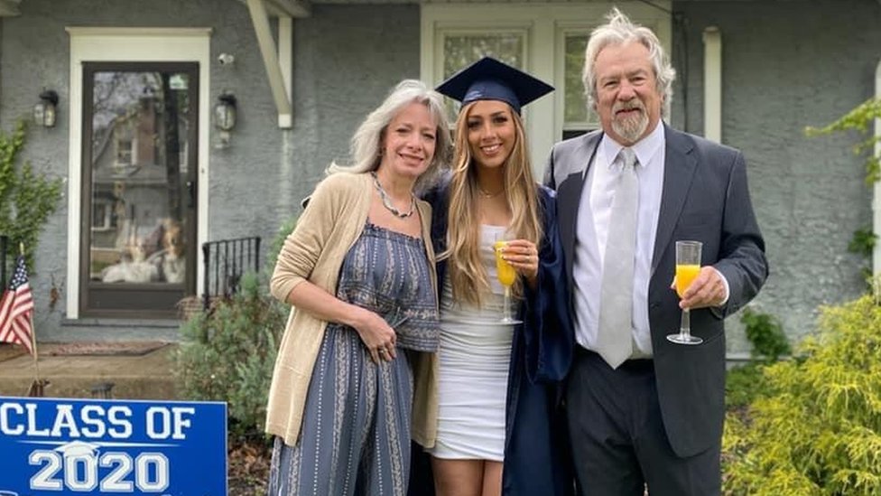 Rachel Delgrego (centre) and her parents