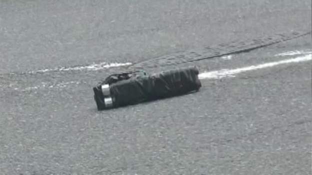 Arma caseira no asfalto