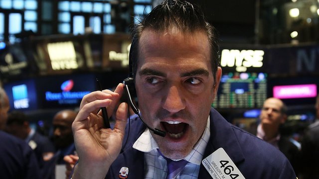 New York Stock Exchange trader talking over headset