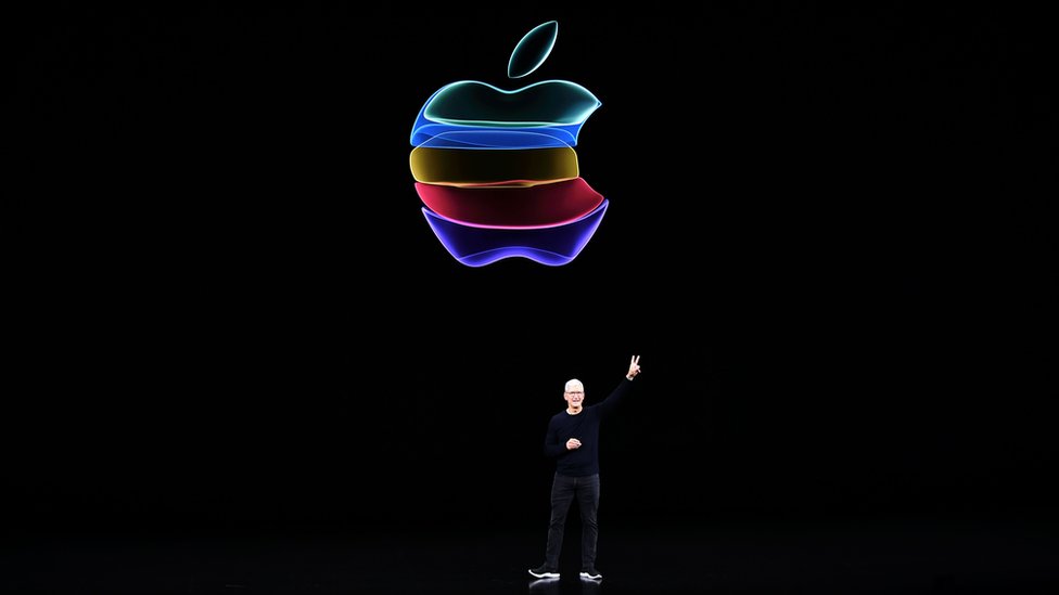 Apple CEO Tim Cook speaks on-stage during a product launch event at Apple's headquarters in Cupertino