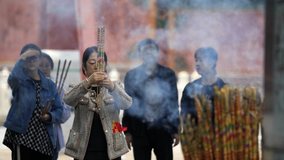 People burn incense to pray for students' good luck in the upcoming 2024 Gaokao, China's National College Entrance Examination, at Harbin Confucius Temple on June 2, 2024 in Harbin, Heilongjiang Province of China