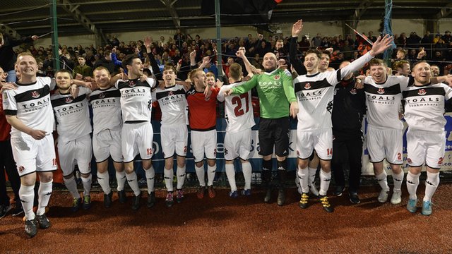 Crusaders team celebrate winning the Irish Premiership with a 3-1 victory over Cliftonville at Solitude