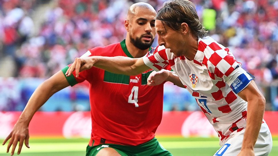 Sofyan Amrabat of Morocco and Croatia's Luka Modric
