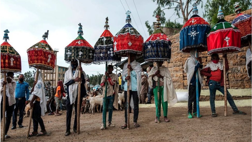 Ethiopian Orthodox devotees are pictured during a procession on the eve of the Ethiopian New Year, in the city of Mekele, Ethiopia, on 10 September, 2020