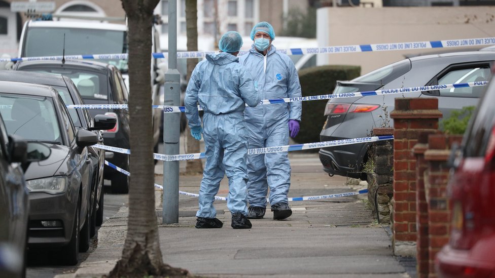 Forensic officers at the scene in Tavistock Gardens