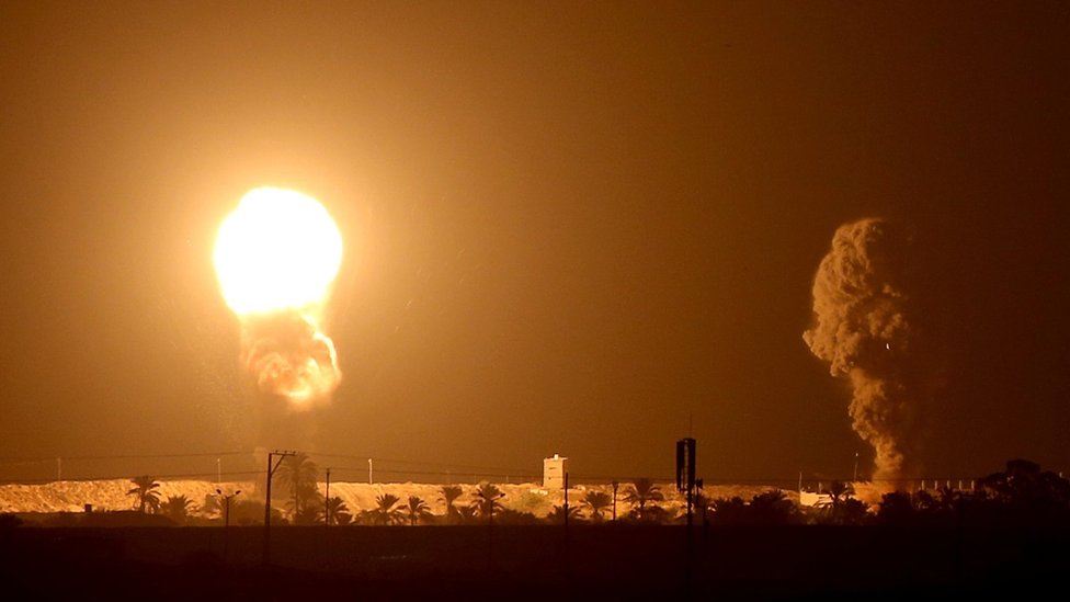 Flames rise from the Gaza Strip following an Israeli strike (16 September 2020)