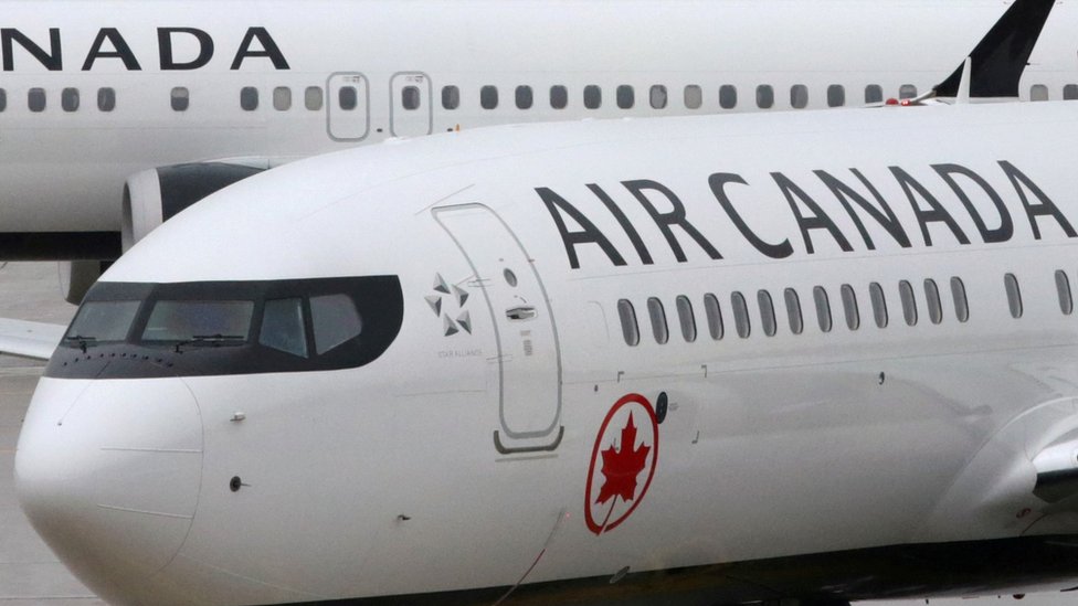 Air Canada planes are pictured in Toronto in March 2019