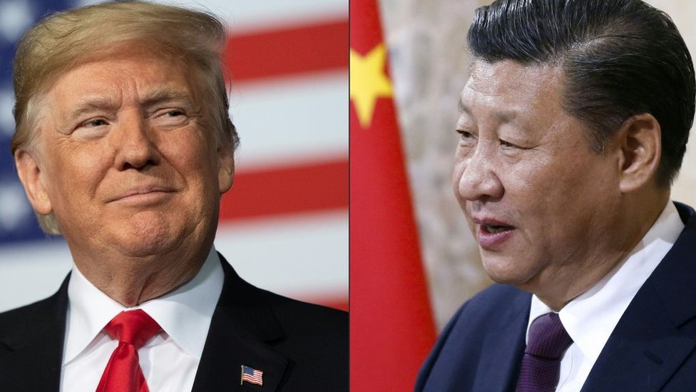 На этой комбинации изображений, созданных 14 мая 2020 года, показаны недавние портреты президента Китая Си Цзиньпина (справа) и президента США Дональда Трампа.