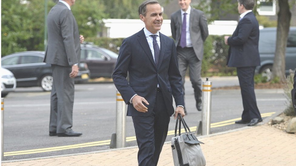 men carrying tote bags