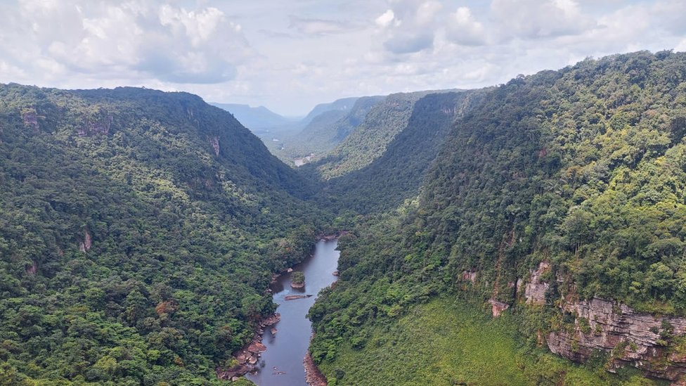 Aerial view of the Potaro River near Kaieteur, the world's largest single drop waterfall, located in the Potaro-Siparuni region of Guyana, on April 12, 2023. The Kaieteur National Park is part of Essequibo, an oil-rich disputed area of 160,000 square kilometers that is administered by Guyana but which Venezuelans voted to claim as theirs in a referendum.