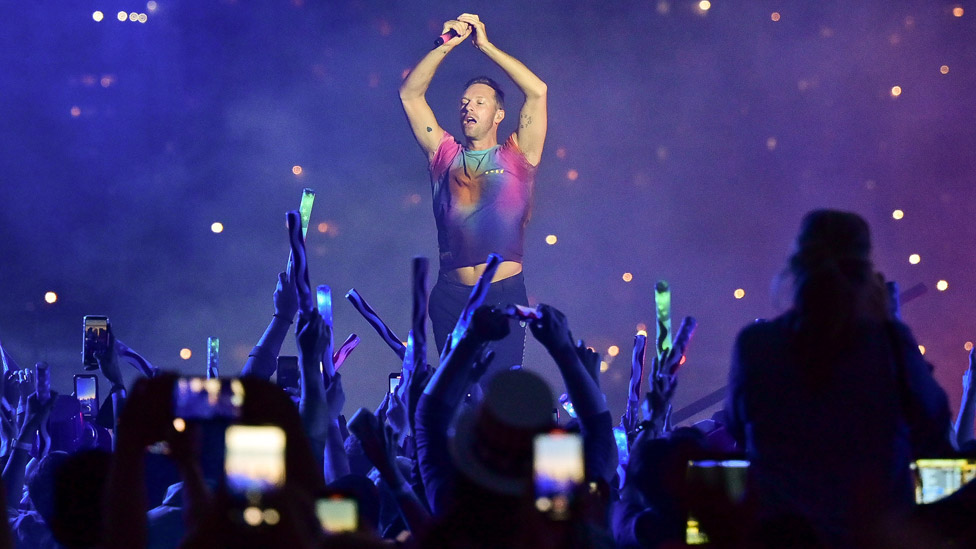 Coldplay on stage in New York in June