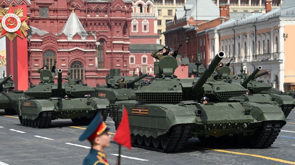 Russian T-90M and T-14 Armata tanks parade through Red Square during the general rehearsal of the Victory Day military parade in central Moscow