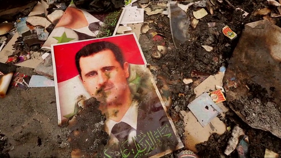 Обугленное фото Асада
