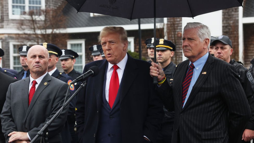 Jonathan Diller: Trump attends wake of New York policeman shot on duty