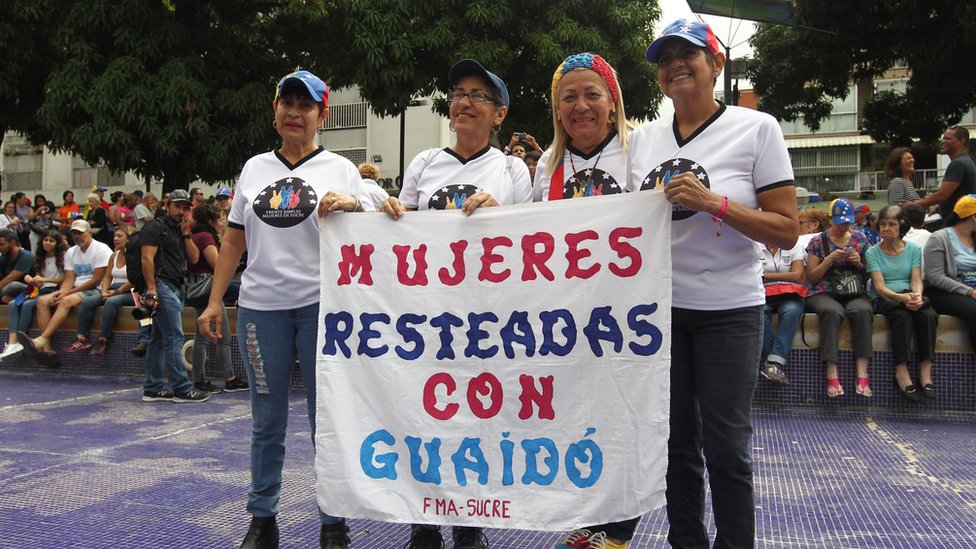 Mujeres simpatizantes de Guaidó en una manifestación por el Día de la Mujer