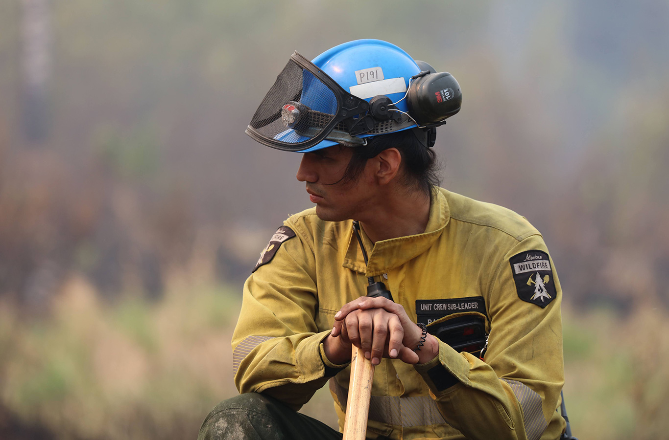 A Canadian firefighter at a wildfire in Sturgeon Lake Cree Nation