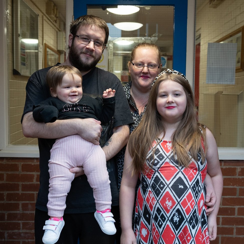 The Dawson family on the doorstep of their home in Nottingham