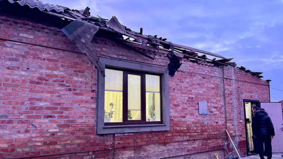 A picture of a damaged house, shared by a Russian official, in what he said to be a Ukrainian on Belgorod