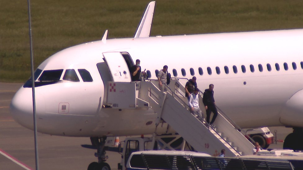A UK deportation flight lands at Albania's Tirana airport