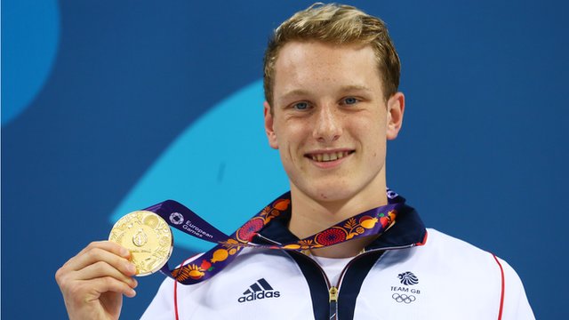 Luke Greenbank wins gold in the 100m backstroke