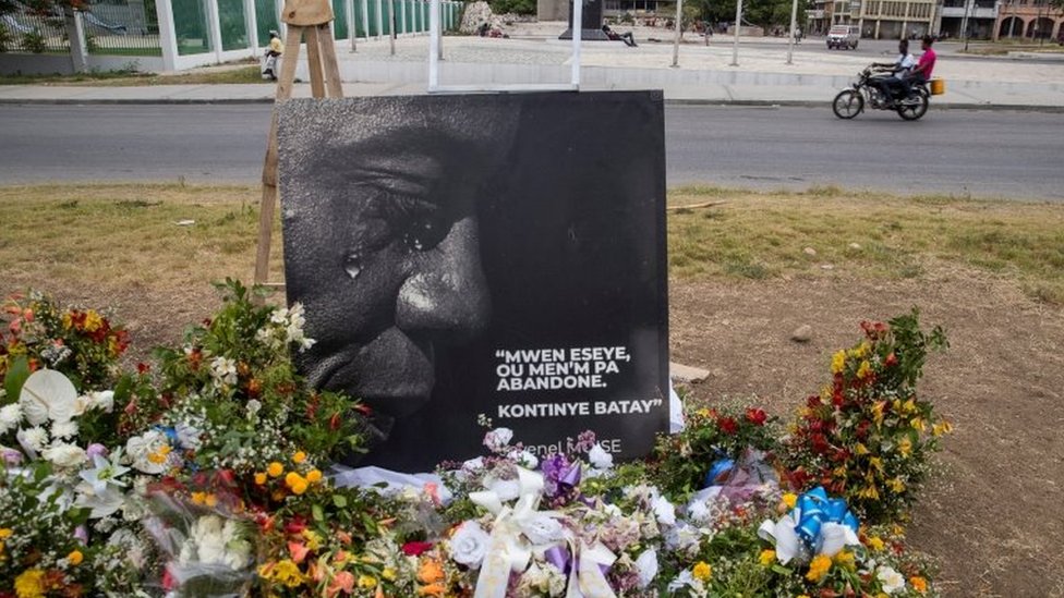 A view of an altar with flowers made as a tribute to President Jovenel Moise, assassinated a week ago at his home; in front of the National Palace in Port-au-Prince, Haiti, 14 July 2021