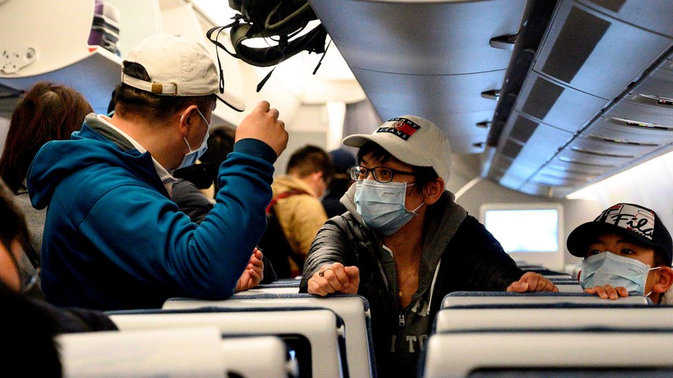 Пассажиры в самолете в Шанхае