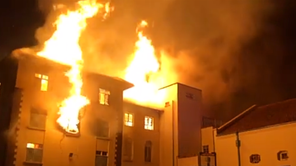 Flames engulfing the main building at Makerere University, Kampala, Uganda - September 2020