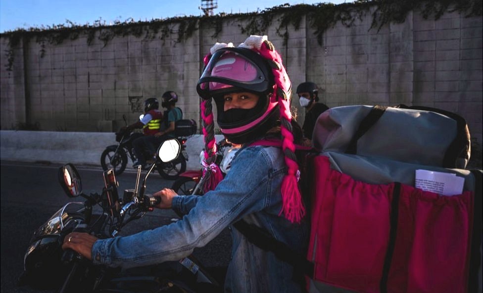 A delivery worker takes part in a demonstration against delivery apps on 25 July, in Belo Horizonte, Brazil