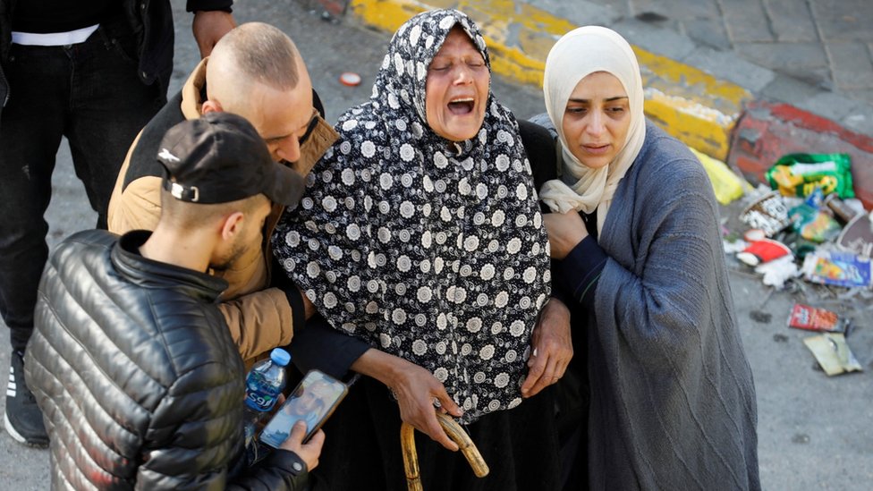 A woman reacts during a funerals of a Palestinian killed during an Israeli raid in Nablus, in the occupied West Bank (22 February 2022)