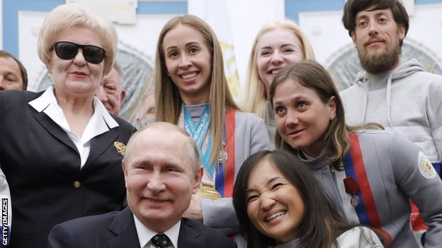 Russian President Vladimir Putin with Paralympic athletes