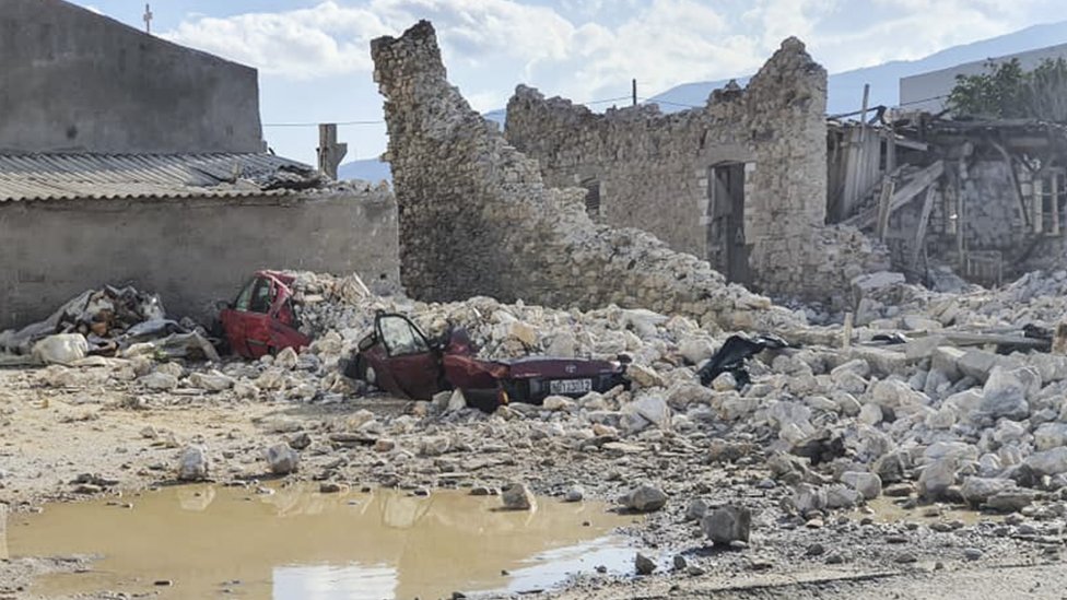 Cars crushed by a collapsed building on Samos, Greece. Photo: 30 October 2020