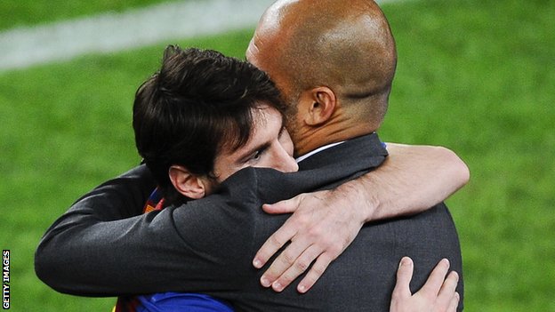 Lionel Messi hugs Pep Guardiola